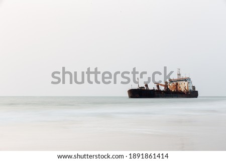 Long exposure shot of a dredger at the shores of Surathkal beach