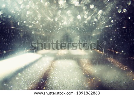 Abstract photography of lens flare. concept image of space or time travel fiction background over dark colors and bright lights