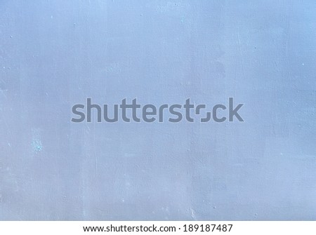 blue background with structure at a painted wall
