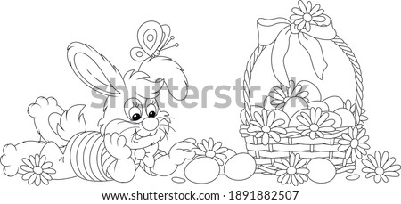 Happy little bunny and a wicker basket of Easter eggs decorated with flowers and a ribbon bow, black and white outline vector cartoon illustration for a coloring book page