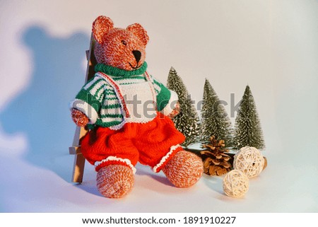 teddy bear with christmas gift