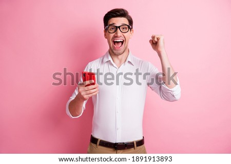 Photo of hooray guy type telephone hand fist wear spectacles white shirt isolated on pink color background