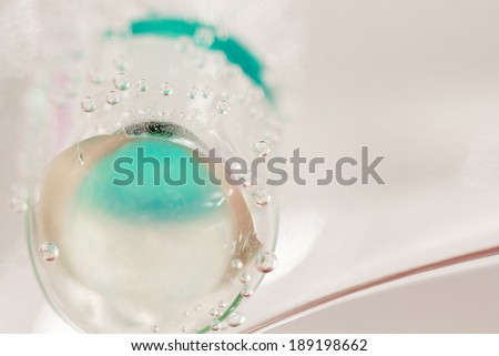 Abstract composition with underwater tubes with colorful jelly balls inside and bubbles 