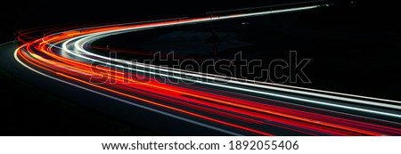 lights of moving cars at night. long exposure Royalty-Free Stock Photo #1892055406