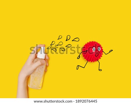 Child with  sprays with antiseptic to the coronavirus Covid-19 bacteria. Healthy lifestyle, medical, school concept.