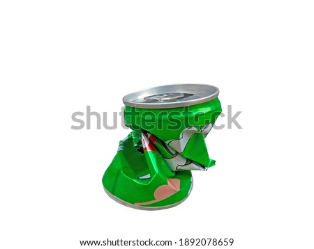 Crumpled green can isolated on white background