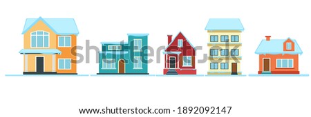 Merry Christmas house with snow. Winter christmas house, snow covered decorated building. Cozy, fabulous, colorful houses with smoking chimneys, in a snow-covered town