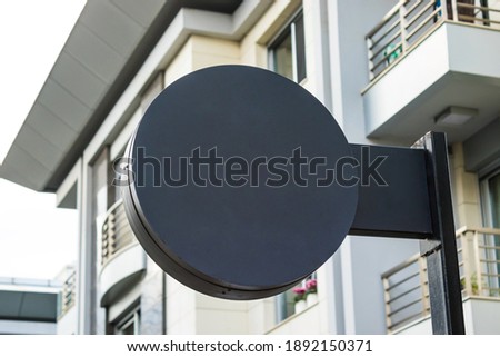 signboard mockup and template empty frame for logo or text on exterior street advertising city shop background, modern flat style