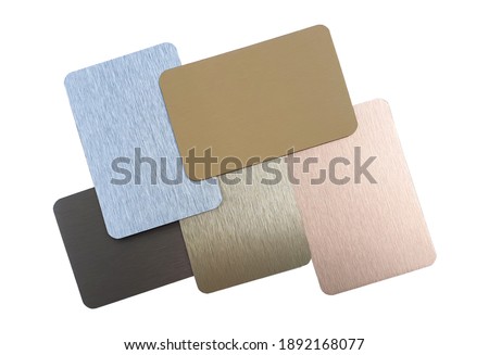 hairline metallic laminated samples containing  silver ,gold ,rose gold ,nigel and copper texture. set of multi color and texture of aluminum or stainless samples isolated on white background.