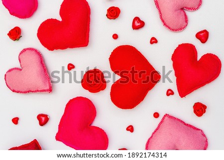 Assorted red and pink hearts isolated on white background. Valentine's day or Wedding romantic concept, top view, copy space, flat lay
