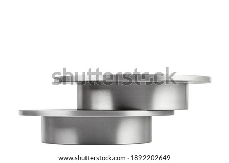 a pair of brake discs lies one on top of the other side view, spare parts isolated on white background.