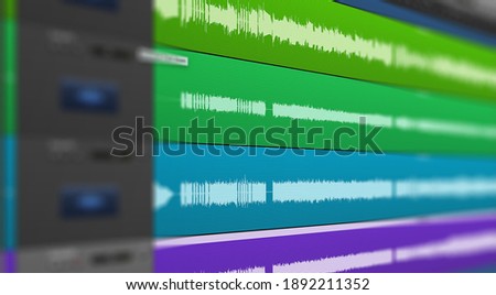Image of multitrack sound audio wave on monitor. Recording, Mixing, and mastering in studio.