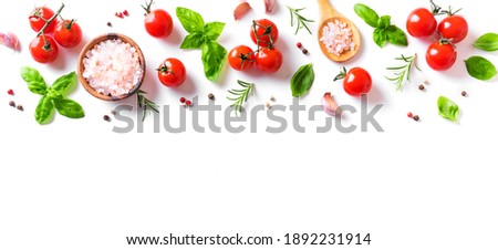 Fresh tomatoes, basil, sea salt and spices banner isolated on white background. Healthy food and vegan raw eating concept, creative flat lay.