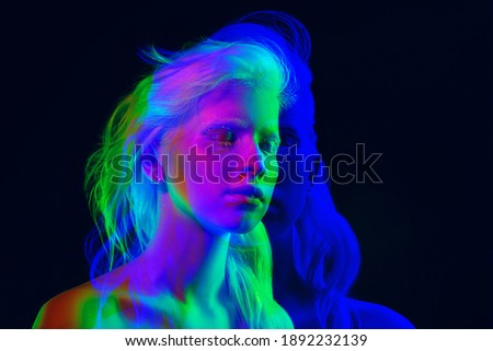 Disco. Multiple portrait with glitch duotone effect. Multiple exposure, abstract fashionable beauty photo. Young beautiful female model posing. Youth culture, composite image, fashionable people.