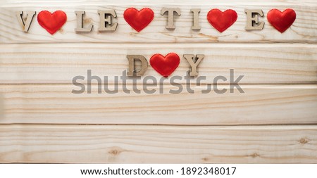 Valentine's day nested on a wooden background.