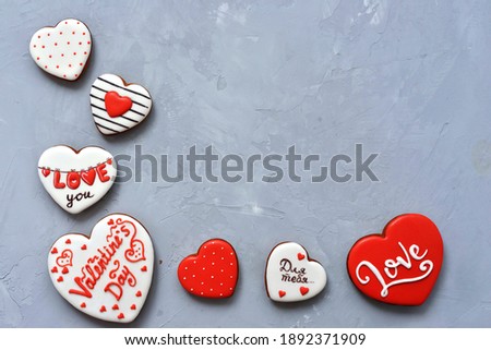Valentine's day Homemade cookies on Ultimate Gray background, top view. Space for text. Delicious and sweet, covered with icing with a beautiful pattern gingerbread inscription in Russian - for you