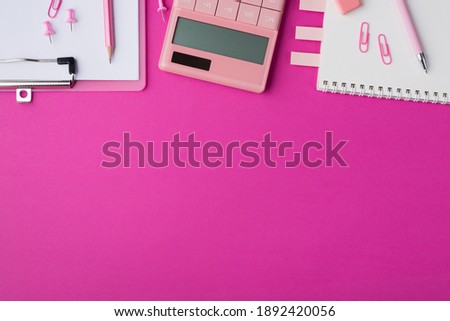 Workspace concept. Top above overhead close up flat lay view photo picture mock up of office supplies and calculator isolated bright color pink backdrop with space for design text
