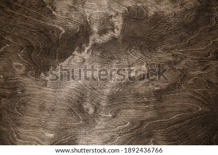 textured brown wood background. close 