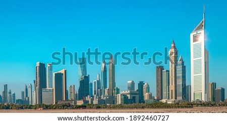 Dubai downtown - modern city business center skyline with luxury skyscrapers, United Arab Emirates