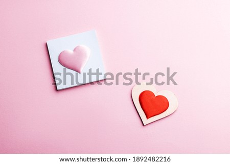 romance and love concept. heart shape over pink pastel background. above view. valentine day conceptual.greeting card template.
