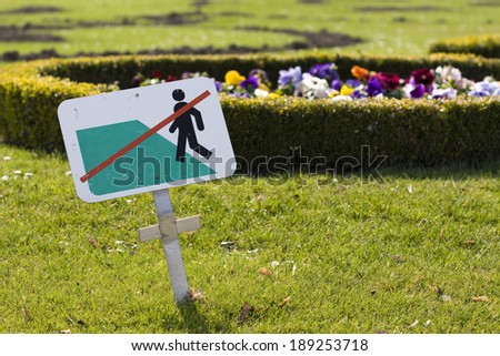 Do not step on grass in a park