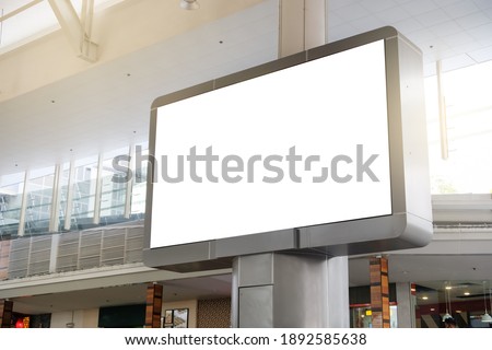 Billboard mockup and building background. Template of an empty information outdoor billboard indoor stadium with the roof, Mock-up of a city banner placeholder and poster.