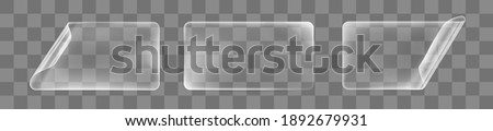 Transparent glued rectangle stickers with curled corners mock up set. Blank adhesive transparent paper or plastic sticker label with curled and wrinkled effect. 3d realistic vector icon Royalty-Free Stock Photo #1892679931