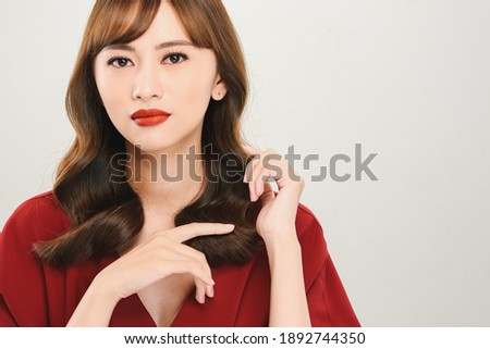young Woman touching her Healthy hair