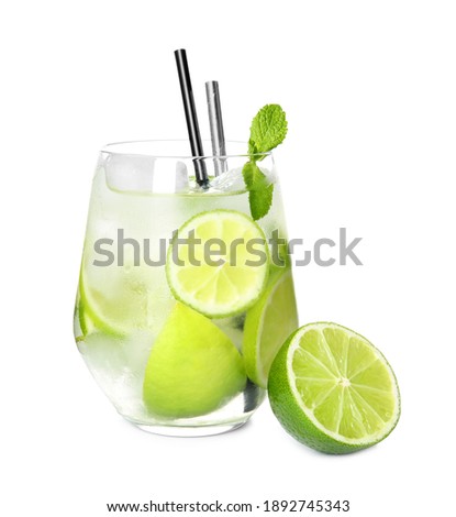 Glass of delicious mojito and lime on white background Royalty-Free Stock Photo #1892745343