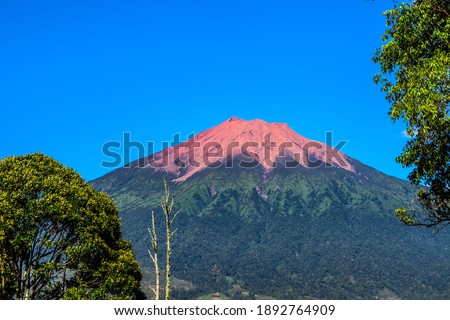 Mount Kerinci is the highest mountain in Sumatra and the highest volcano in Indonesia with an altitude of 3805 masl in the Kerinci Seblat National Park area. Kayu Aro, Kerinci, Jambi, Indonesia, Asia. Royalty-Free Stock Photo #1892764909