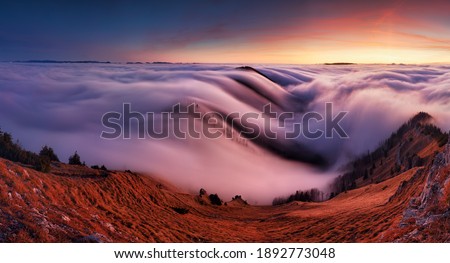 Sunset in the autumn mountains above the clouds during the weather inversion Fatra mountains in Slovakia, beautiful landscape Royalty-Free Stock Photo #1892773048