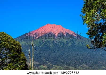Mount Kerinci is the highest mountain in Sumatra and the highest volcano in Indonesia with an altitude of 3805 masl in the Kerinci Seblat National Park area. Kayu Aro, Kerinci, Jambi, Indonesia, Asia. Royalty-Free Stock Photo #1892773612