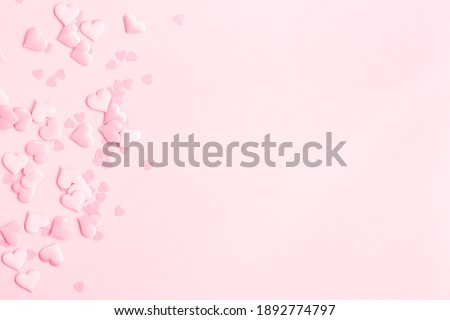 Valentine's Day background. Pink hearts on pastel pink background. Valentines day concept. Flat lay, top view, copy space Royalty-Free Stock Photo #1892774797