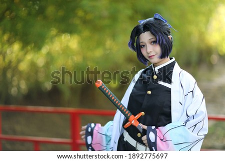 Japan anime cosplay portrait of girl with comic costume with japanese theme