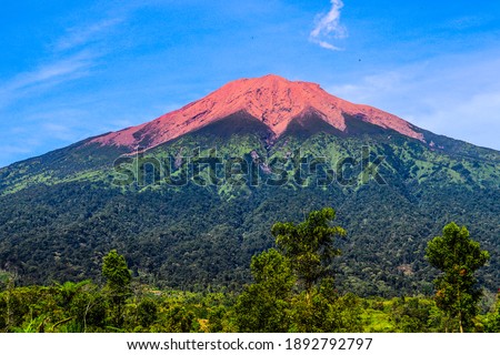 Mount Kerinci is the highest mountain in Sumatra and the highest volcano in Indonesia with an altitude of 3805 masl in the Kerinci Seblat National Park area. Kayu Aro, Kerinci, Jambi, Indonesia, Asia. Royalty-Free Stock Photo #1892792797