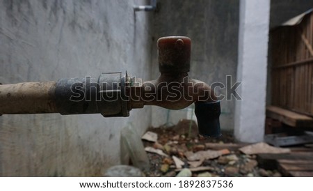 photo of a tool that serves to cover the water or often called a faucet