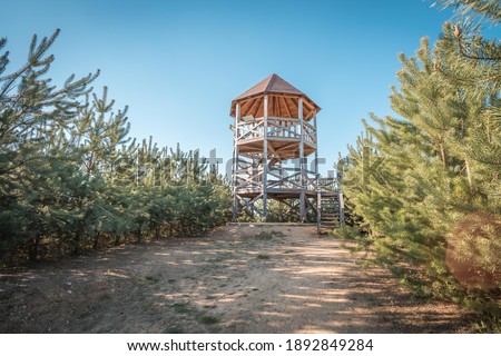Rozhledna Kosice is a lookout tower in the forest park ner city Chlumec nad Cidlinou. It ios made of wood and it is 8m tall. Observation tower picture from summer.