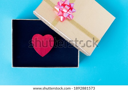 Red heart and gift box love and valentines day concept