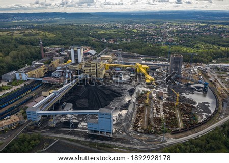 Coal mine in Poland. Mine janina in Libiaz. Industrial  abstract sendimentation tank of mine in Poland. Industrial lake Aerial drone photo view  