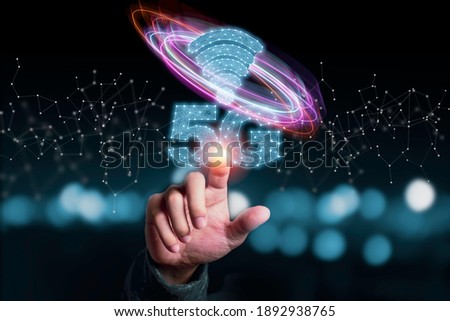 5G and internet of things or IOT concept, Hand touching virtual 5G signal. IOT is high technology which every device will connect and control by 5G high speed internet. Royalty-Free Stock Photo #1892938765