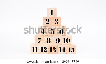 An image of numbered wooden blocks isolated on white background.