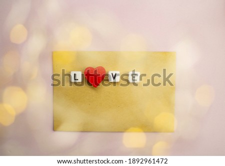 The word love consists of cubes with a space for the signature. Social networks and valentines background beauty concept