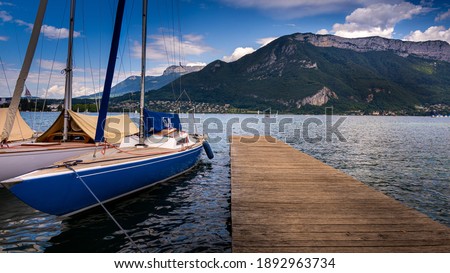 Some Boats and the mountains of Lake Annecy, France