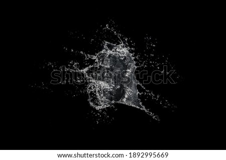 water splash isolated on black background Royalty-Free Stock Photo #1892995669