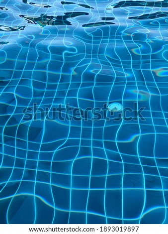 The pattern blue water of pool