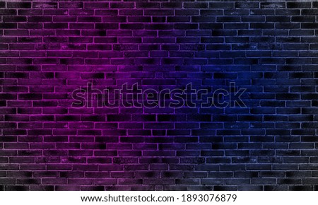 Lighting effect red and blue on brick wall for background