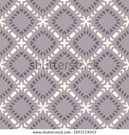 Vector geometric seamless pattern in ethnic style. Simple abstract background with grid, lattice, floral shapes, crosses, rhombuses. Elegant texture in lilac, purple and beige color. Repeat design