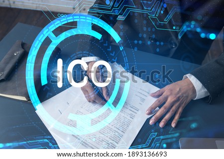 Woman signs agreement. ICO icon hologram. Double exposure . Blockchain concept.