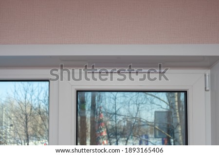 inlet vent adjustable valve over the airtight window Royalty-Free Stock Photo #1893165406