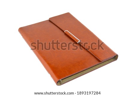 Brown leather diary notebook isolated on white